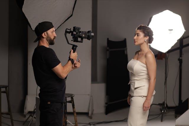 Professional photographer with camera and equipment